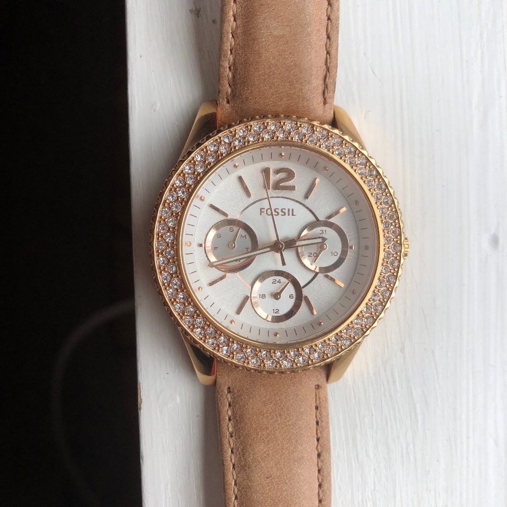 gold frame diamond studded fossil watch